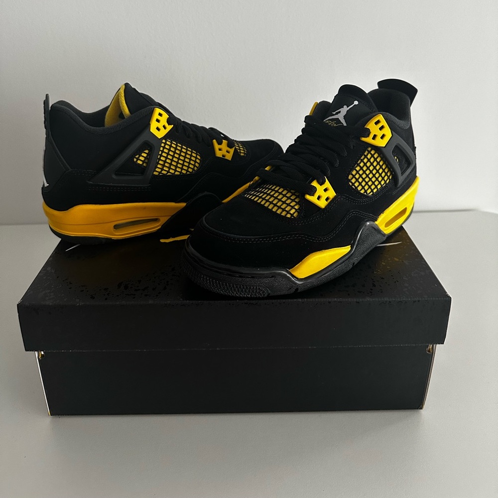 Authentic Jordan Retro 4s Thunders. Brand new, never worn.